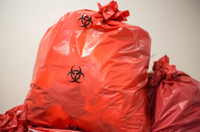 red bag of bio hazard waste